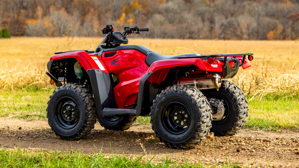 Rancher , Avenger Red, in field. Left facing.