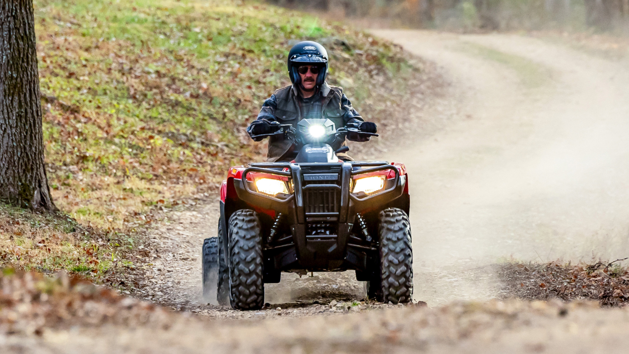 Front view of rider on Rubicon on road.