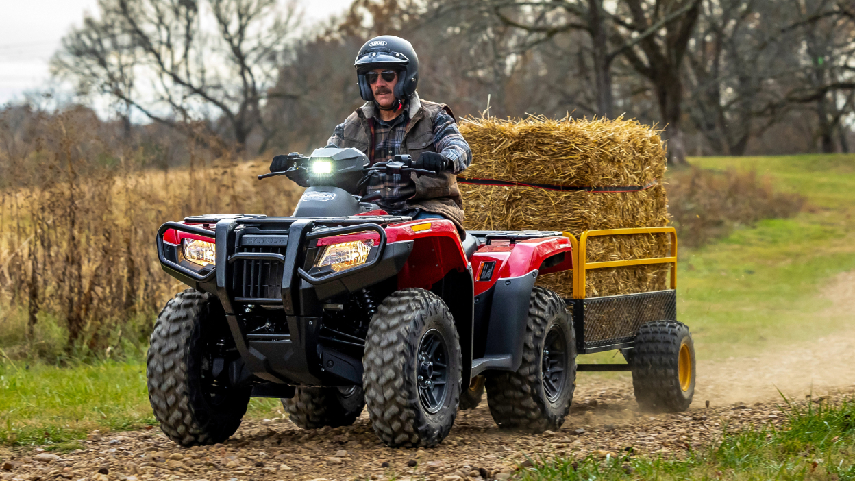 Man on Rubicon trailing hay.
