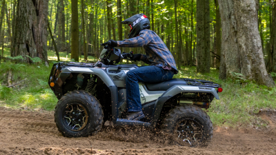 Left view of rider on Rubicon in woods.