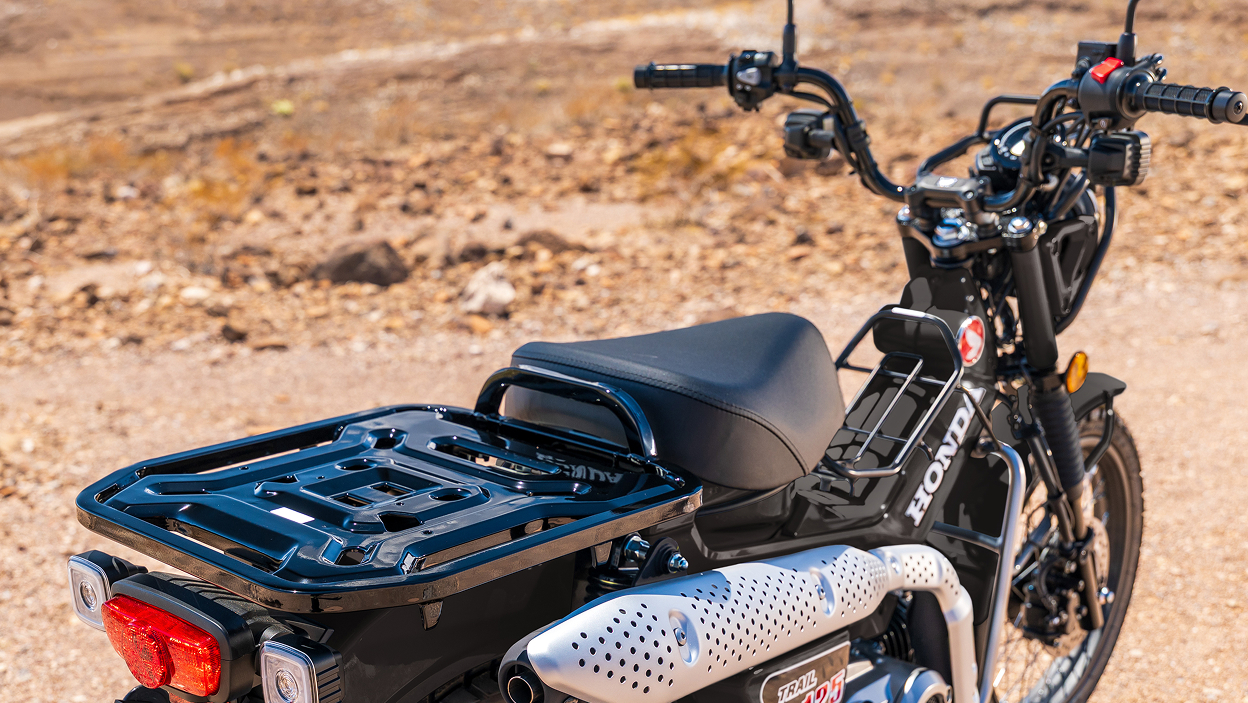 Rear of Trail 125. Desert landscape in background.