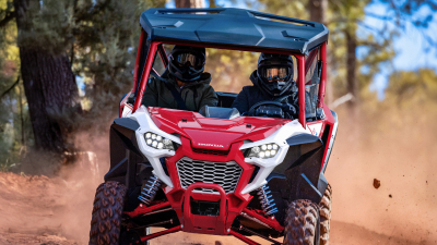 Front view of Talon 2-P on dirt road.